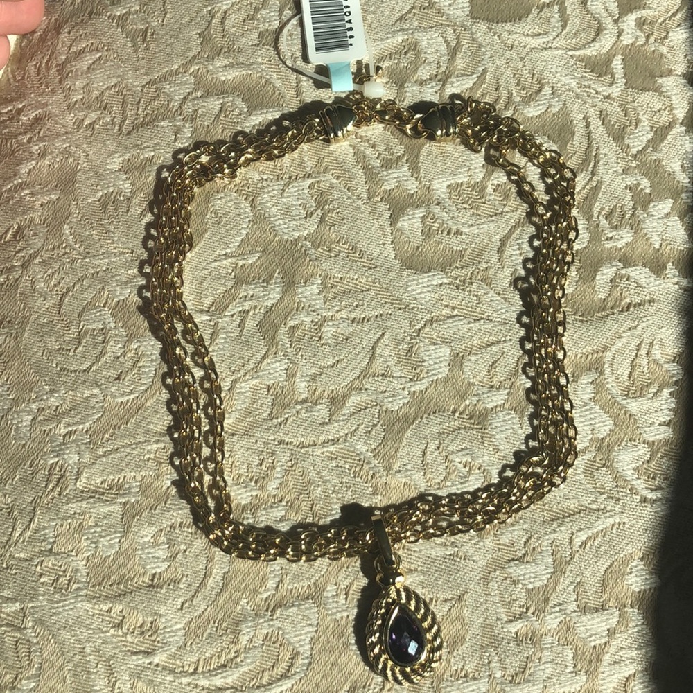 Fox’s purple stone necklace